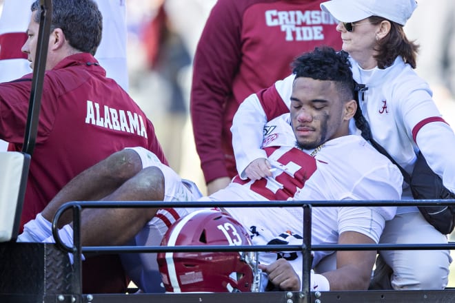 Alabama Crimson Tide quarterback Tua Tagovailoa was carted off the field against Mississippi State. Photo | Getty Images