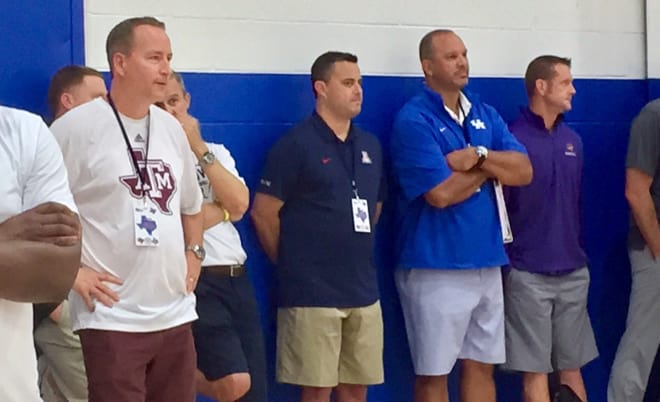 Billy Kennedy and Sean Miller evaluate prospects.