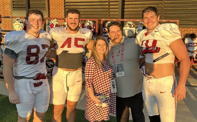 Co-owner of R&R Cigars, Reagan Starner (second from right), supplies cigars to the Alabama football football team before this weekend's game against Tennessee. Submitted photo