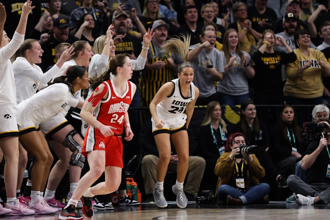 Mar 5, 2023; Minneapolis, MINN, USA; Iowa Hawkeyes guard Gabbie Marshall (24) celebrates her shot against the Ohio State Buckeyes during the second half at Target Center.