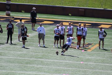 Dennis kicking at Wake Forest camp in June