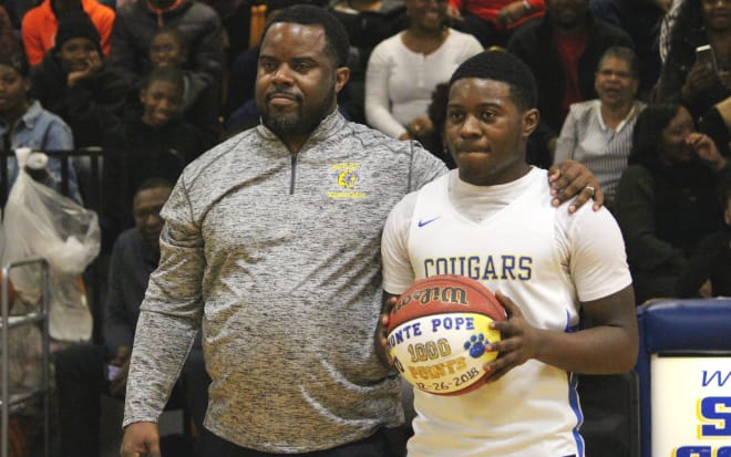 Surry's Monte Pope surpassed 1000 career points while playing for his father, Head Coach James Pope, as the Cougars beat Sussex Central before taking down Peninsula Catholic to capture their own Holiday Classic