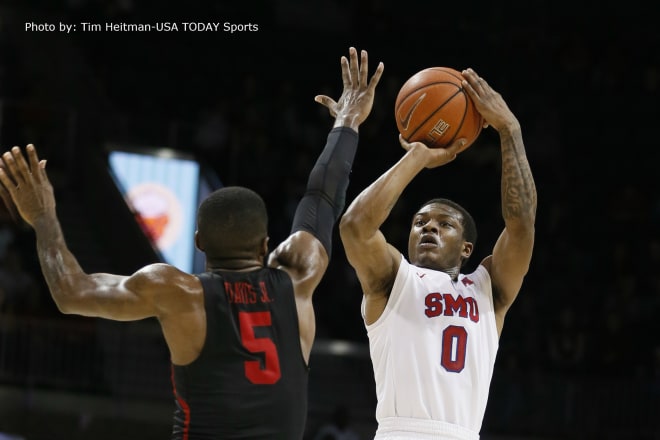 SMU guard Jahmal McMurray (0) shoots against Houston Cougars guard Corey Davis Jr. (5) during the second half at Moody Coliseum.