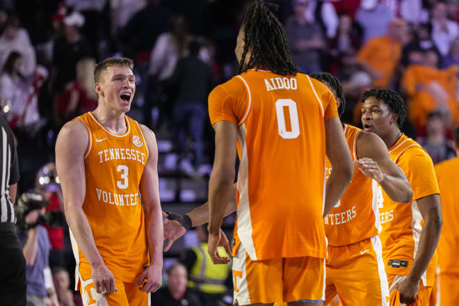 Jan 13, 2024; Athens, Georgia, USA; Tennessee Volunteers guard Dalton Knecht (3) reacts with forward Jonas Aidoo (0) after defeating the Georgia Bulldogs at Stegeman Coliseum. Mandatory Credit: Dale Zanine-USA TODAY Sports