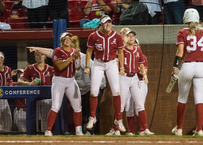 Alabama Crimson Tide outfielder Jordan Stephens (25) reacts after catcher Ally Shipman (34) scored during a quarterfinal game against the Arkansas Razorbacks in the SEC Softball Tournament. Photo | Brett Rojo-USA TODAY Sports