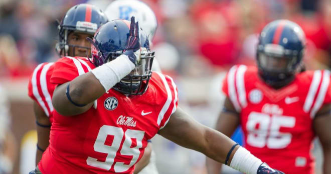 Ole Miss continues to investigate Walter Hughes' relationship with DL Herbert Moore and former teammate Bobby Billingsley.