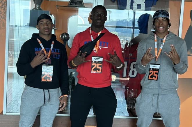 Austin Howard (middle) with teammates during his trip to Knoxville.