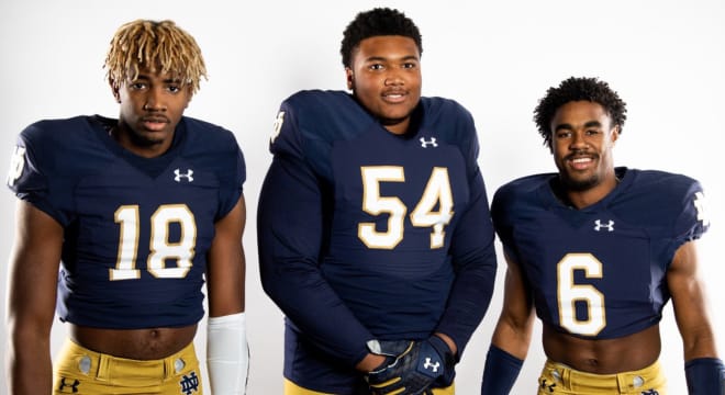 Notre Dame commits Deion Colzie (18) and Blake Fisher (54) spent time recruiting Donovan Edwards on Saturday.