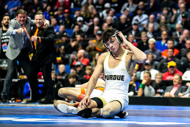 Purdue's Matt Ramos, right, reacts after losing his match to Princeton's Pat Glory at 125 pounds in the finals during the sixth session of the NCAA Division I Wrestling Championships, Saturday, March 18, 2023, at BOK Center in Tulsa, Okla. 230318 Ncaa Final Wr 112 Jpg