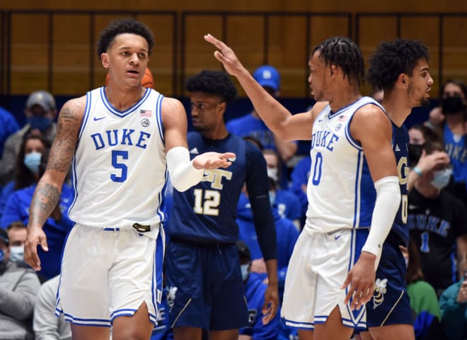 Duke freshman power forward Paolo Banchero, left, and guard Wendell Moore will host NC State at 2 p.m. Saturday.