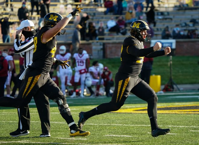 Harrison Mevis celebrates after making the game-winning field goal against Arkansas.