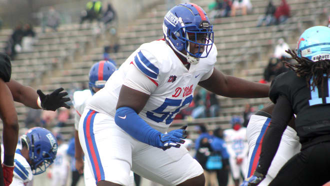 Rivals250 offensive lineman Cameron Williams holds a Michigan Wolverines football recruiting offer.