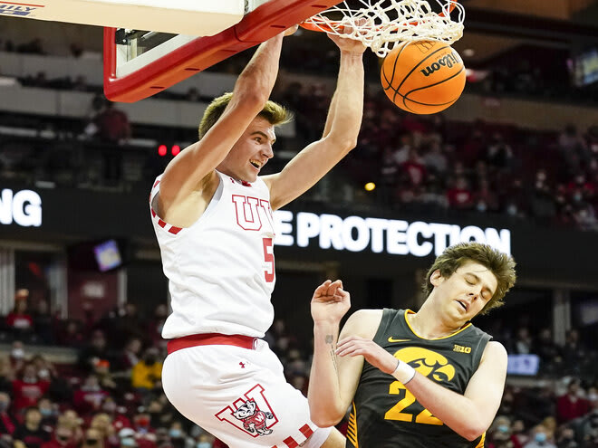 Tyler Wahl converts a slam dunk in Wisconsin's 87-78 victory over Iowa Thursday