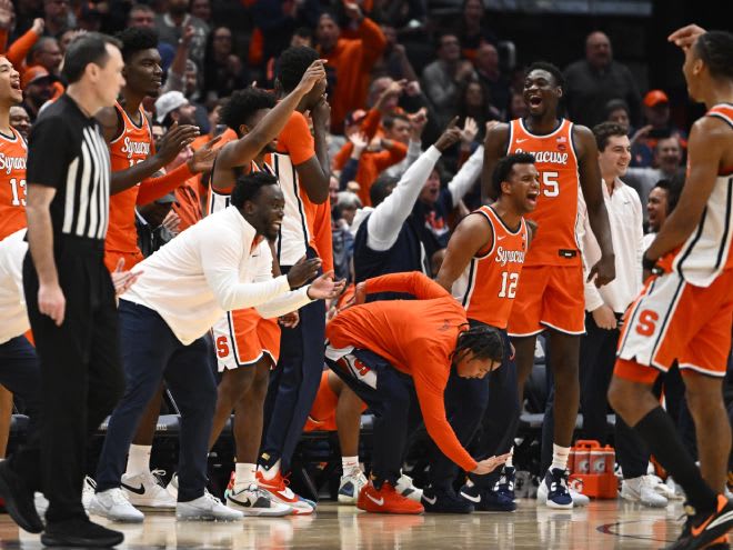 Dec 9, 2023; Washington, District of Columbia, USA; Syracuse Orange players celebrate /against/ during the second half at Capital One Arena. Mandatory Credit: Brad Mills-USA TODAY Sports