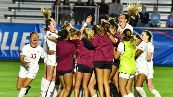 The Florida State soccer team celebrates Thursday's NCAA semifinal win over Virginia.