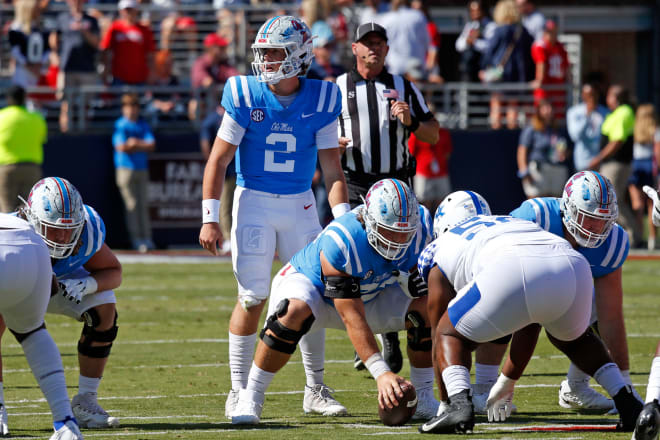 Ole Miss Rebels quarterback Jaxson Dart (2) lines up under Mississippi Rebels offensive linemen Eli Acker (73) during the first quarter against the Kentucky Wildcats at Vaught-Hemingway Stadium. Mandatory Credit: Petre Thomas-Imagn Images