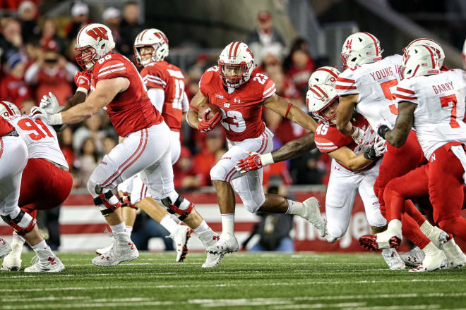 Wisconsin running back Jonathan Taylor averages a nation's best 169.8 yards per game. 