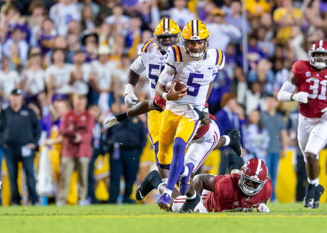 Quarterback Jayden Daniels runs the ball as the LSU Tigers take down Alabama 32-31 at Tiger Stadium in Baton Rouge, La. Photo | SCOTT CLAUSE/USA TODAY Network / USA TODAY NETWORK