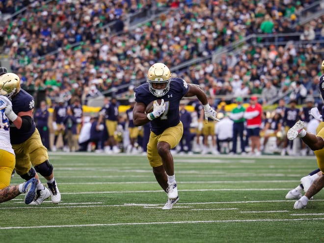 Notre Dame running back Audric Estimé was given a big hole to score the first of his three touchdowns against Pitt.