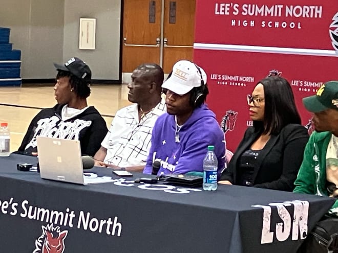 Williams Nwaneri dons a Mizzou hat following his commitment to the Tigers