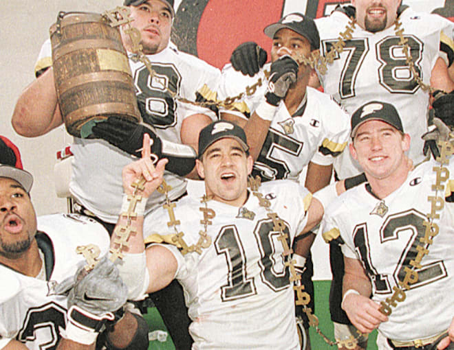Lee Brush (10) celebrates with his senior classmates a 52-7 win at Indiana in 1997.