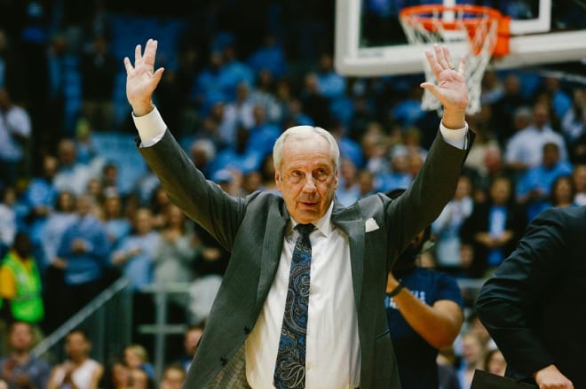 UNC Coach Roy Williams tied his mentor with 879 victories on Monday night at the Smith Center.