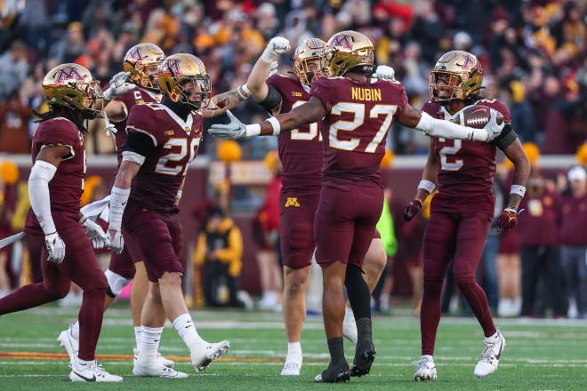 Nov 4, 2023; Minneapolis, Minnesota, USA; Minnesota Golden Gophers defensive back Tyler Nubin (27) celebrates his interception against the Illinois Fighting Illini during the second half at Huntington Bank Stadium. Mandatory Credit: Matt Krohn-USA TODAY Sports