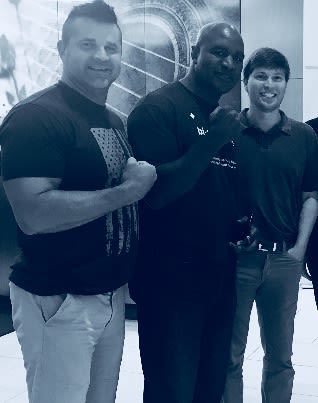 World Heavyweight Champion Benjamin Craddock and hotel magnate Joseph Simpson spend some time together at The Westin Jackson with a father of a Georgia Bulldogs running back.