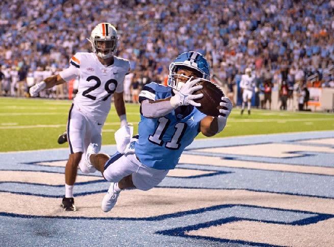 Josh Downs set North Carolina records last season with 101 receptions and 1,335 receiving yards. 