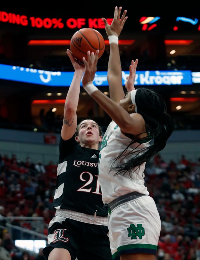 Louisville s Emily Engstler makes shoots over Notre Dame s Maya Dodson. Feb. 13, 2022,  at the KFC Yum! Center in Louisville, Ky.
