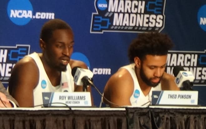 Theo Pinson and Joel Berry on the dais following Sunday's loss.