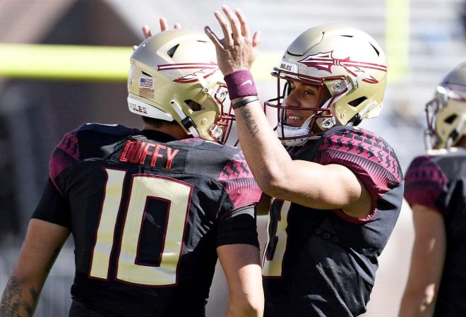 Jordan Travis (right) and A.J. Duffy are two of the FSU football team's three current quarterbacks on scholarship.