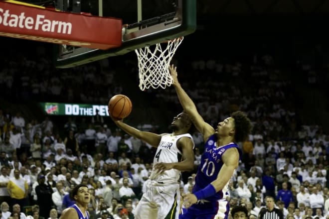 Baylor's LJ Cryer goes for a driving layup against Kansas on Monday at the Ferrell Center.