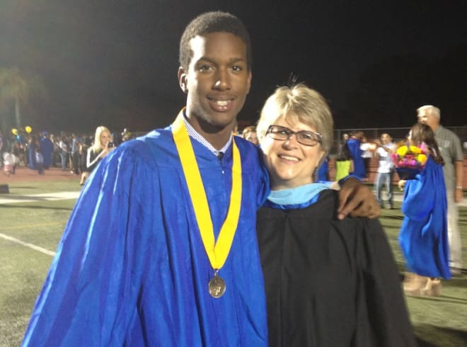 Collins and Reyes at high school graduation from El Toro