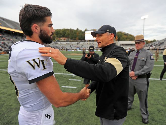 Post-Game 2022:Demon Deacons QB Sam Hartman (10) speaks with Army Black Knights head coach Jeff Monken 