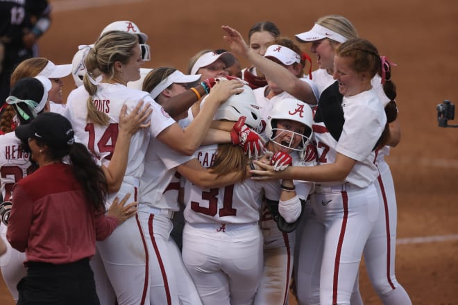 Alabama softball players celebrate as Kenleigh Cahalan provided a walk-off single to be South Carolina. Photo | Alabama Athletics 