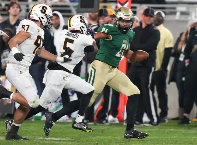 Cole Shivers (5) tries to make a tackle in the Arizona state championship game.