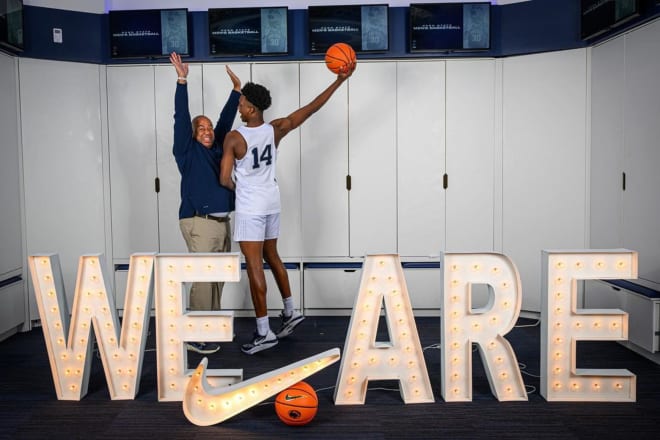 The relationship between Notre Dame head coach Micah Shrewsberry, left, and four-star guard Sir Mohammed, right, goes back to Shrewsberry's time at Penn State. The two posed together for this photo on Mohammed's visit to Penn State.
