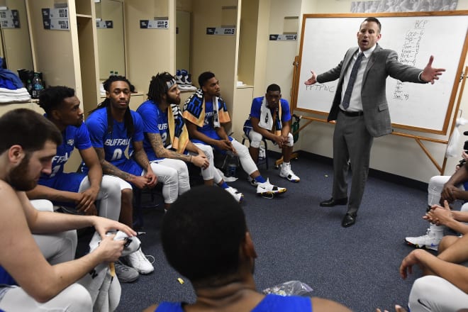 Nate Oats talks to his team at Buffalo in the locker room. Photo | Getty Images 