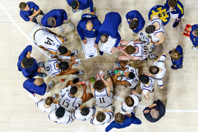 The Notre Dame men's basketball team huddles during a timeout Friday on their way to a 60-56 win over Marist.