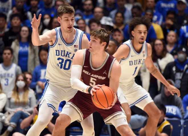 Duke's Kyle Filipowski, left, defends Bellarmine's Peter Suter on Monday night.