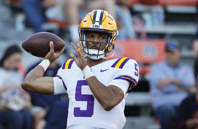 LSU Tigers quarterback Jayden Daniels (5) warms up before the game against the Auburn Tigers at Jordan-Hare Stadium. Photo | John Reed-USA TODAY Sports