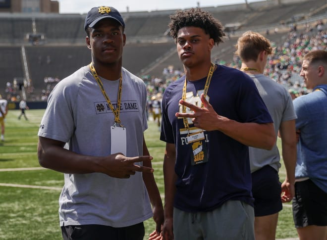 June-arriving Notre Dame football freshmen Aamil Wagner (left) and Holden Staes take in the Blue-Gold Game, April 23 at Notre Dame Stadium.
