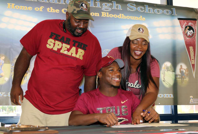 Nation's No. 2 sprinter Chauncy Smart smiles after signing with FSU. (Courtesy of The Ledger)