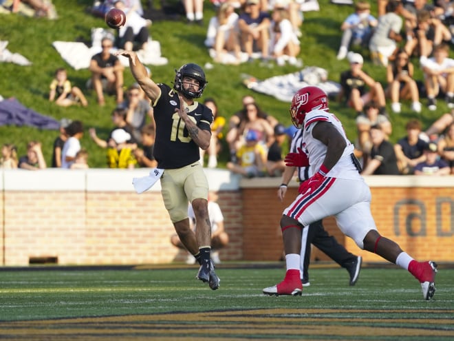 Quarterback Sam Hartman, left, threw 110 touchdown passes in his Wake Forest career.