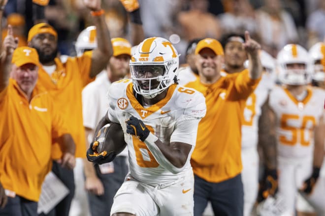 Tennessee running back Dylan Sampson (6) runs with the ball during the second half of an NCAA college football game Sunday, Sept. 8, 2024, in Charlotte, N.C. (AP Photo/Scott Kinser)