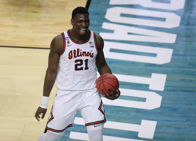  Illinois Fighting Illini center Kofi Cockburn (21) reacts after a dunk against the Drexel Dragons during the first round of the 2021 NCAA Tournament at Indiana Farmers Coliseum.