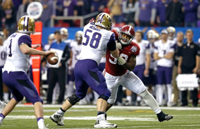 Jake Browning (left) with Kaleb McGary (right) vs Alabama in the Chick-fil-A Peach Bowl. 