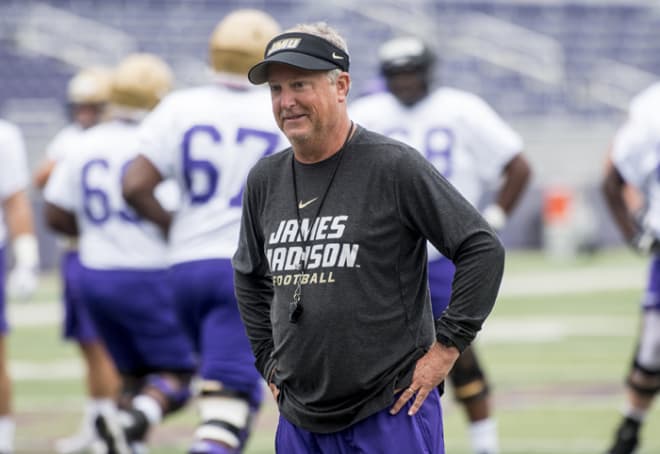 James Madison offensive coordinator Donnie Kirkpatrick watches on during the Dukes' practice last week.