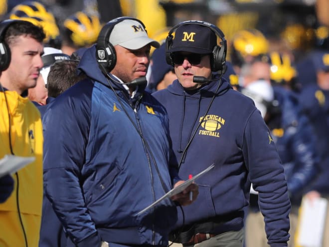 Michigan Wolverines football offensive coordinator Josh Gattis and head coach Jim Harbaugh